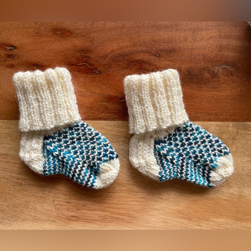 Last chance! 
Hand knit Baby Socks—that will actually stay on your baby’s feet!